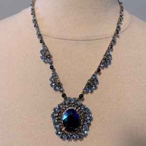 Sorelli necklace. Never worn. Blue pendant surrounded by multicolor crystals